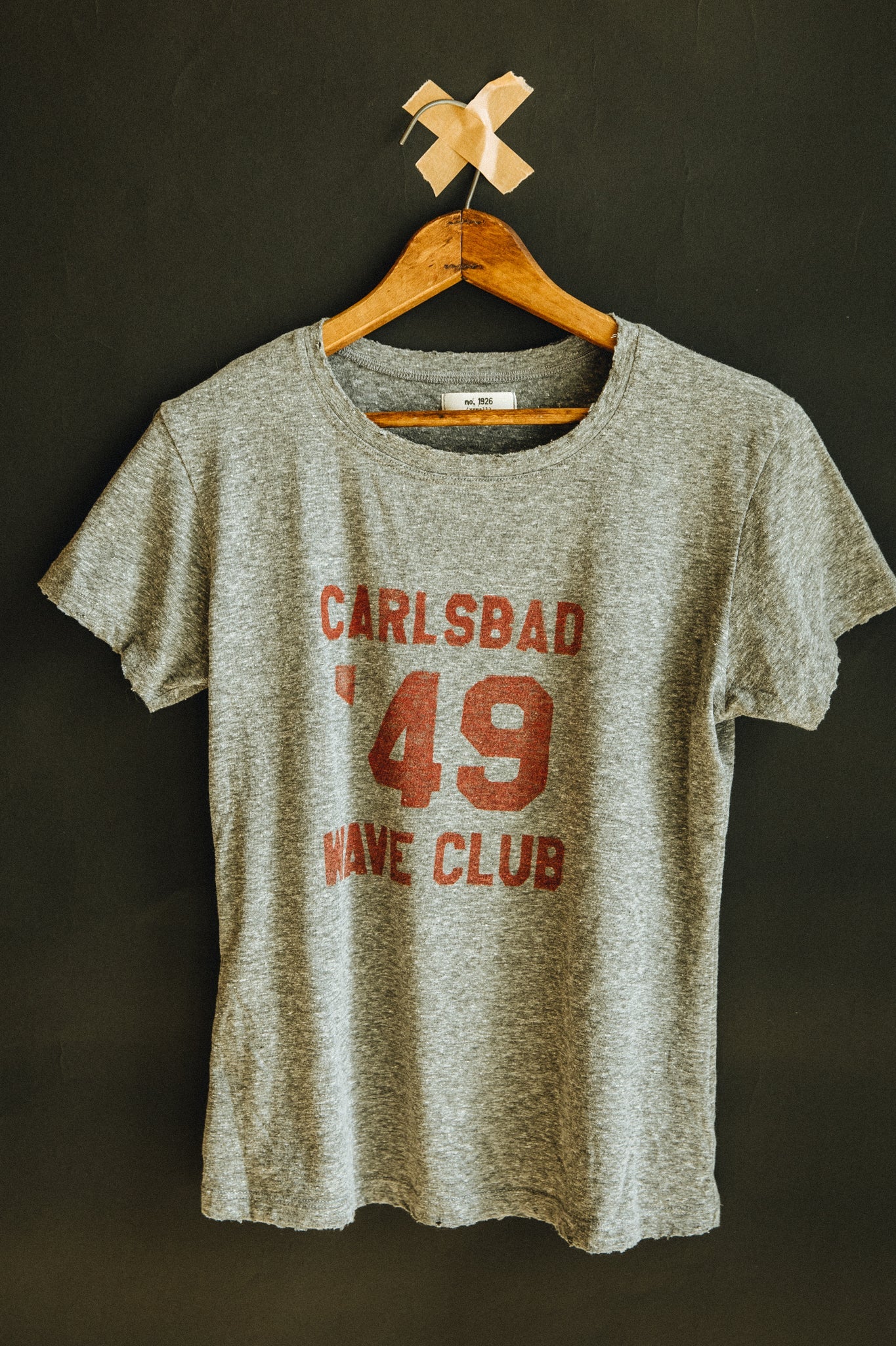 
                  
                    the "carlsbad wave club" tee Tee Number 1926   
                  
                